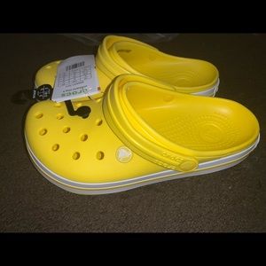 Children’s yellow crocs